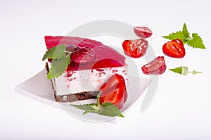 Summer strawberry mousse cake with fresh berries on white background.