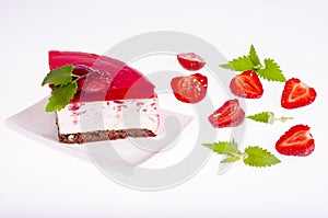 Summer strawberry mousse cake with fresh berries on white background.