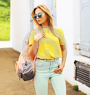 Summer street fashion, stylish hipster girl in sunglasses