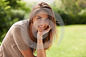 Summer sun is the best source of vitamin D. a woman enjoying the sunshine outdoors.