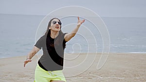 Summer Sun and Fun at the beach - girls relax and have a great time at the oceanfront