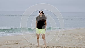 Summer Sun and Fun at the beach - girls relax and have a great time at the oceanfront