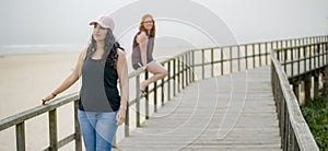 Summer Sun and Fun at the beach - girls relax and have a great time at the oceanfront