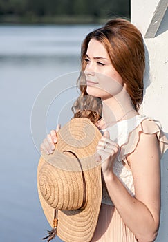 Summer sunny lifestyle fashion portrait of young stylish hipster woman walking on park outdoors, wearing cute trendy outfit, smili