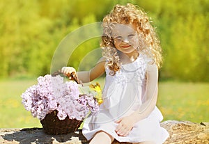 Summer sunny portrait charming curly little girl