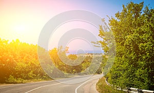 Summer Sunny road . Road trip. Summer vacation by car. Travel around the country. Article and advertising about a summer vacation