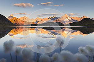 Summer sunrise landscape view of the Mont-Blanc mountain range reflecting in the Lacs de Fenetre