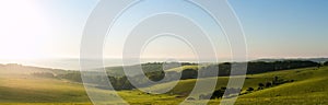 Summer sunrise over English countryside landscape