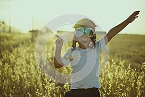Summer sunset, Boy playing to be airplane pilot, funny guy with