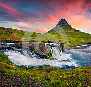 Summer sunset on famous Kirkjufellsfoss Waterfall and Kirkjufell