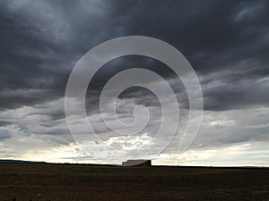 Summer sunset with grey clouds