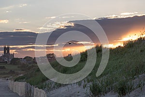 A summer sunset over the beach in Newport, Rhode Island