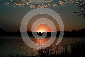 Summer sunset over lake in Minnesota