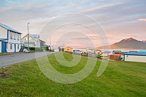 Summer sunset in the village on island of Hrisey in Iceland