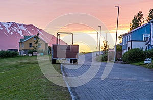 Summer sunset in the village on island of Hrisey in Iceland