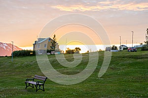 Summer sunset in the village on island of Hrisey in Iceland