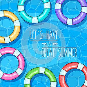 Summer swimming pool top view background with colorful lifebuoys on blue water
