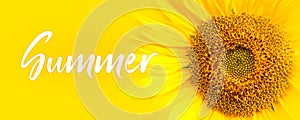 Summer text and sunflower close-up details. oncept for summer, sun, sunshine, tropical summer travel and hot days. photo