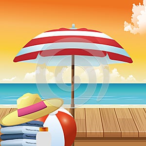 Summer time in beach vacations umbrella hat ball towels and sunblock