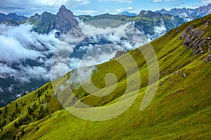 Summer time in Dolomites. landscape with mountains, hills and trees