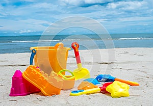 Summer time and kids toys on tropical sand beach