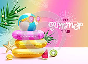 Summer time vector design. It\'s summer time greeting text with colorful floaters and beachball photo