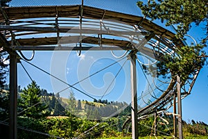 Summer toboggan in Switzerland. Run Strobl made of stainless steel. Amusement Park