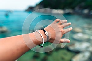 Summer travek concept beach souvenir bracelet photo