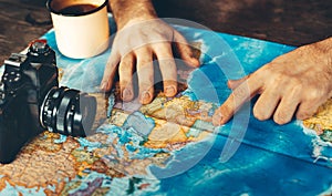 Summer Travel Destination Concept. Mens Hands On Map Indicate Final Destinationm With Point, Close up