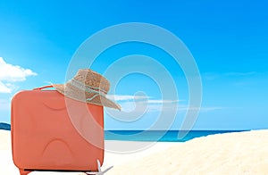 Summer traveling with old suitcase and Fashion woman, fish star, sun glasses, hat. Travel in the holiday, blue sky and beach backg