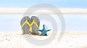 The Summer Tropical beach with starfish and sandals as white sand beach scene