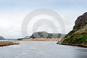 Summer tundra. Rocky coastline of Barents Sea near Teriberka. Scenery of Russian North. Kola Peninsula, Murmansk Oblast