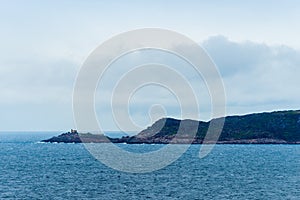 Summer tundra. Rocky coastline of Barents Sea near Teriberka. Scenery of Russian North. Kola Peninsula, Murmansk Oblast