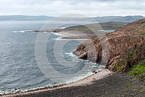 Summer tundra. Rocky coastline of Barents Sea near Teriberka. Scenery of Russian North. Kola Peninsula, Murmansk Oblast