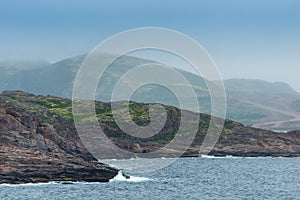 Summer tundra. Rocky coastline of Barents Sea near Teriberka. Scenery of Russian North. Kola Peninsula, Murmansk Oblast