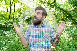 Summer vacation concept. Explore wild nature activity. Emotional nature lover. Man handsome beard and mustache in summer