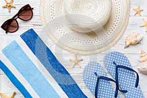 Summer vacation concept flat lay. beach accessories and towel top view. Space for text. travel concept