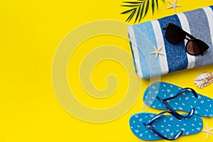 Summer vacation concept flat lay. beach accessories and towel top view. Space for text. travel concept