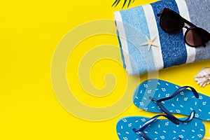 Summer vacation concept flat lay. beach accessories and towel top view. Space for text. travel concept