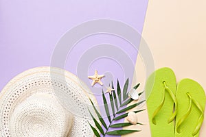 Summer vacation concept flat lay. straw hat beach accessories and flip flop top view. Space for text. travel concept