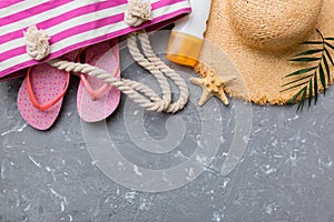 Summer vacation concept flat lay. straw hat beach accessories and towel top view. Space for text. travel concept