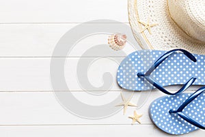 Summer vacation concept flat lay. straw hat beach accessories and towel top view. Space for text. travel concept