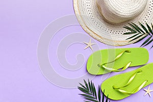 Summer vacation concept flat lay. straw hat beach accessories and towel top view. Space for text. travel concept