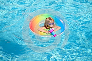 Summer vacation fun. Cute child boy kid in swimming pool.