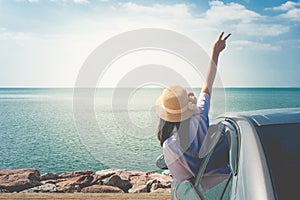 Summer Vacation and Holiday Concept : Happy family car trip at the sea, Portrait woman feeling happiness.