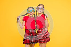 Summer vacation. party time. school prom party. red fashion girls. happy little girls in checkered skirt. funny kids in