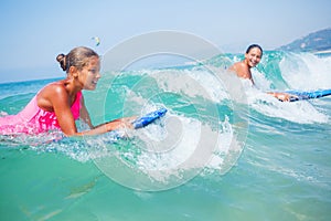 Summer vacation - surfer girls.