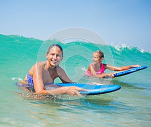 Summer vacation - surfer girls.