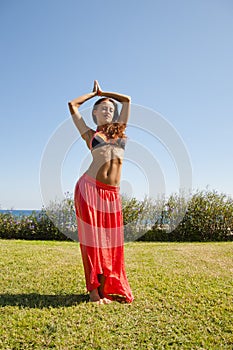 Summer vacation and travel. Perfect body of belly dancer. Suntan. Woman dancing with body. woman with fit belly. Spa and