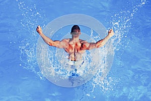 Summer vacation and travel to ocean. Athletic muscle trainer. Young man active leisure - swimming pool concept. Handsome